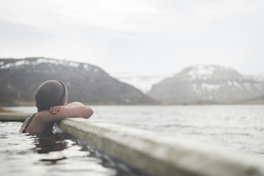 Woman in ice bath outside cold therapy